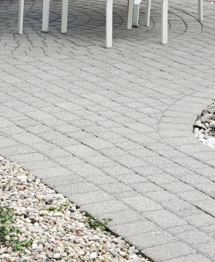 The same circular patio cleaned, joints cleared and re-sanded